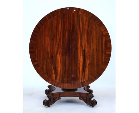 William IV rosewood circular snap top centre tableOn carved column and four scrolled supports, 122 diameter; 74cm highConditi