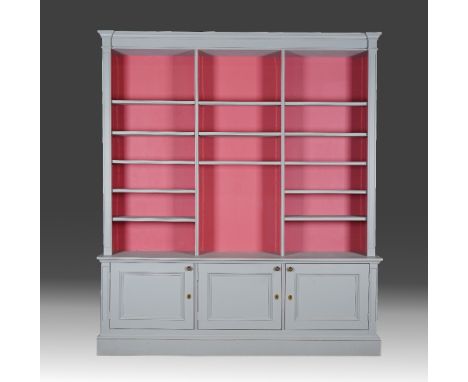 A grey-painted open bookcase cabinet220cm wide; 251cm high; 39cm deep; internal top shelf; 25cm deep; base cupboards 32cm dee