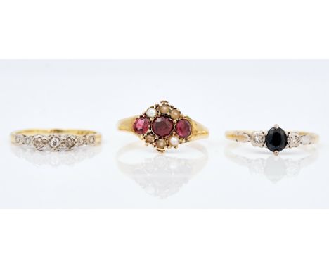 A gold, sapphire and diamond three stone ring and two further rings (3)Comprising;  the sapphire and diamond three stone ring