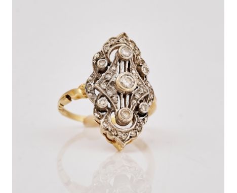 A gold and diamond panel shaped ringIn a pierced oval design, mounted with circular cut diamonds, ring size K, gross weight 4
