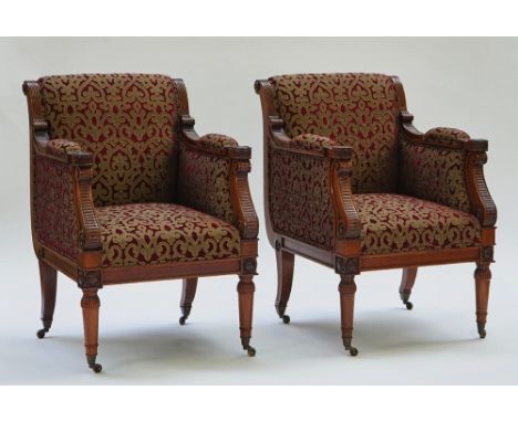 A pair of mahogany framed square back armchairsIn the manner of Holland &amp; Son, on turned supports, 67cm wide; 80cm deep, 