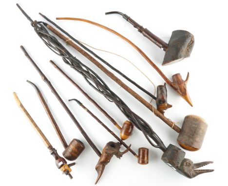 TEN VARIOUS WOOD PIPES (10)19th Century and laterIncluding two French trunk formed pipes, detailed 'ROPP'; a large pipe the b