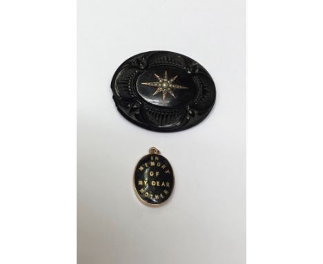 Victorian gold and black enamel mourning locket 'In Memory Of My Dear Mother', together with a Victorian carved jet brooch wi