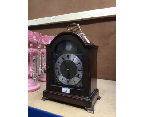Elliot mahogany cased mantel clock retailed by Alexander Clarke with 8-day movement with Westminster and Whittington chimes-k