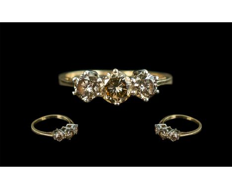 18ct Gold Attractive Three Stone Diamond Set Ring, marked 750 to interior of shank.  The three brilliant cut diamonds of gold