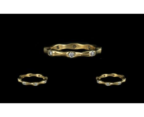 18ct Gold Diamond Full Eternity Ring, set with round modern brilliant cut diamonds.  Unmarked, tests 18 ct.  Ring size N.