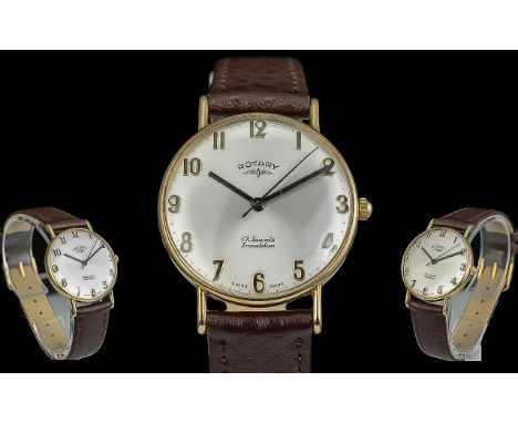 Rotary Gents 9ct Gold Cased Mechanical 17 Jewels Incabloc Wrist Watch with Tan Leather Watch Strap. Features a Pearl Dial, Th