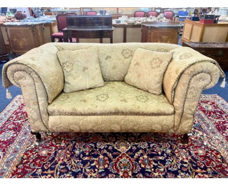 Edwardian Drop Arm Two Seater Sofa, damask fabric upholstery.  Short cabriole legs and casters.  Measures 31" high x 65" wide