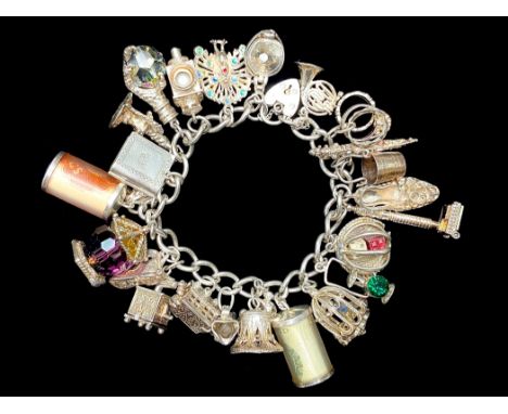 Chunky Silver Charm Bracelet, Loaded with Different Charms, Which Includes Telephone, lamp, shoe, House, Horn, Butterfly, Boo