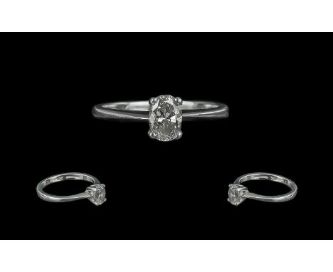 Platinum Ladies Pleasing Single Stone Diamond Ring, marked 950 to shank.  The oval shaped faceted diamond of excellent colour