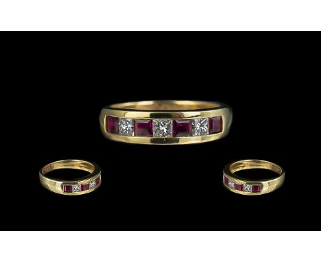 18ct Gold Contemporary Ruby and Diamond Set Band Ring marked 750 full hallmark to interior of shank. The baguette cut diamond