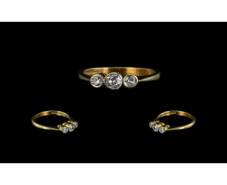 18ct Gold Diamond Ring, set with three round cut diamonds, one chipped, fully hallmarked.  Ring size N.