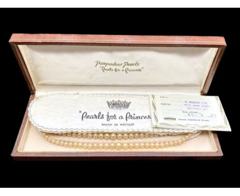 Two Row Pearl Necklace by 'Pompadour Pearls', with stone set clasp, in fitted box.  Guarantee in box.