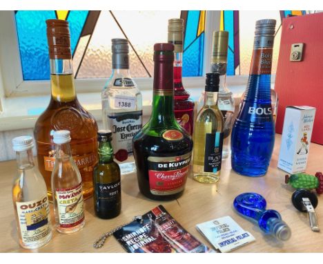 Collection of Cocktail Spirits, comprising Tequila, Grenadine, Bols Blue Curacao, Cherry Brandy, Gordons Gin, Three Barrels H