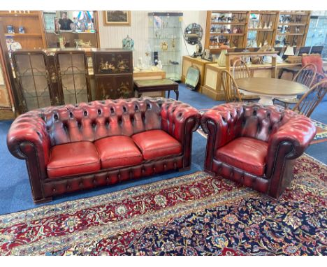 Three Seater Oxblood Leather Chesterfield Sofa, button back, three drop in seats, measures 76" wide x 29" high.  Together wit