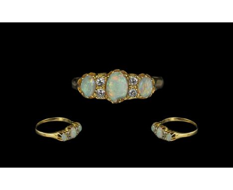 Antique Period Attractive 18ct Gold Opal &amp; Diamond Set Ring, gallery setting, mark rubbed tests 18ct.  Excellent colours 