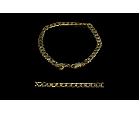 Unisex 9ct Gold Hollow Curb Bracelet From Goldsmiths Jewellers. In As New Condition. Hallmarked for 9ct. Gold Weight Approx 3
