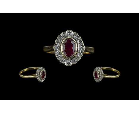 18ct Gold Attractive Ruby and Diamond Set Cluster Ring, full hallmark for 750 - 18ct, the faceted diamonds of excellent colou