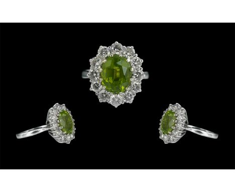 18ct White Gold - Superb Peridot and Diamond Set Cluster Ring ( Flower head ) Marked 18ct to Interior of Shank. The Central F