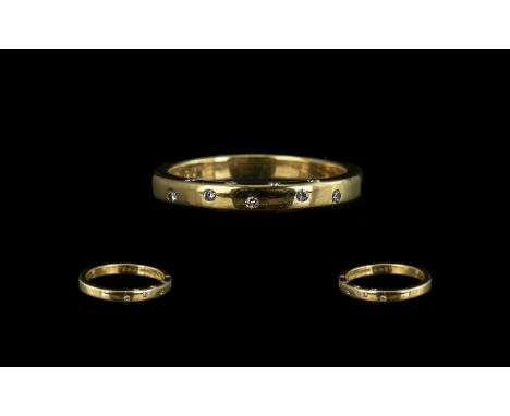 18ct Gold Diamond Eternity Ring, set with 9 brilliant cut diamonds, fully hallmarked, Ring size L.