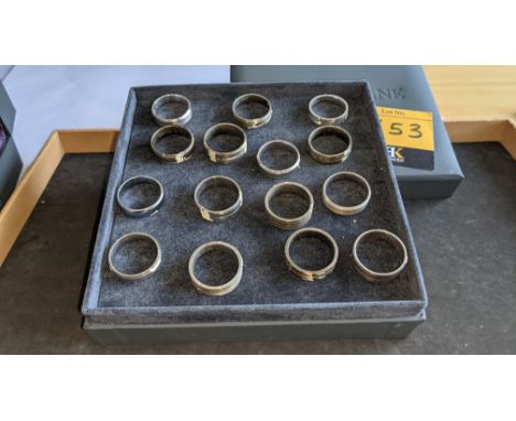 15 assorted, mostly men's rings, in a variety of materials including titanium, steel &amp; silver. These items were in a cabi