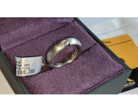 Platinum 950 ring with tension mounted diamond. RRP £3,195We have used a ring sizer mandrel to determine the inside diameter 