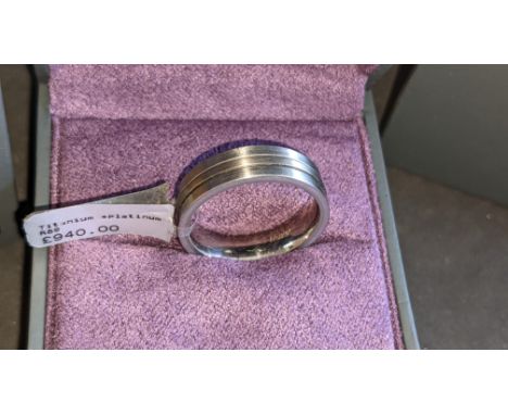 Titanium &amp; platinum ring RRP £940We have used a ring sizer mandrel to determine the inside diameter in mm of this ring, h