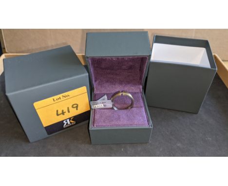 Diamond, titanium &amp; yellow gold tension ring RRP £905We have used a ring sizer mandrel to determine the inside diameter i