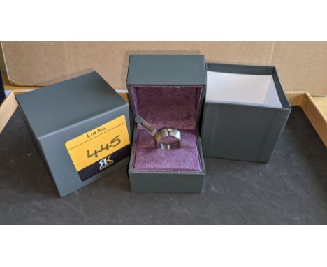 Stainless steel &amp; tension mounted diamond ring RRP £495We have used a ring sizer mandrel to determine the inside diameter