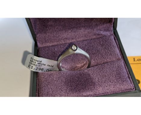 18ct white gold ring with 0.07ct H/Si diamond.  RRP £1,296We have used a ring sizer mandrel to determine the inside diameter 