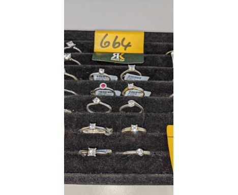 10 off assorted display/sample engagement rings. It is understood that these rings were used for display purposes &amp; are n