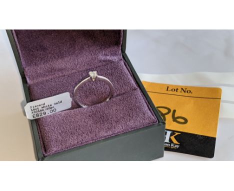 18ct white gold &amp; diamond ring with 0.20ct G/Si central stone. RRP £829We have used a ring sizer mandrel to determine the