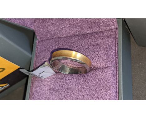 Titanium &amp; 18ct yellow gold ring RRP £683We have used a ring sizer mandrel to determine the inside diameter in mm of this