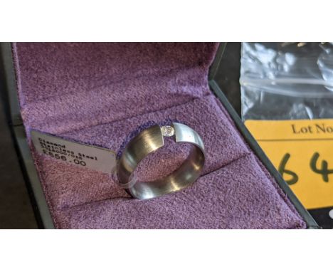 Stainless steel ring with 0.15ct Cognac tension set diamond. RRP £656We have used a ring sizer mandrel to determine the insid