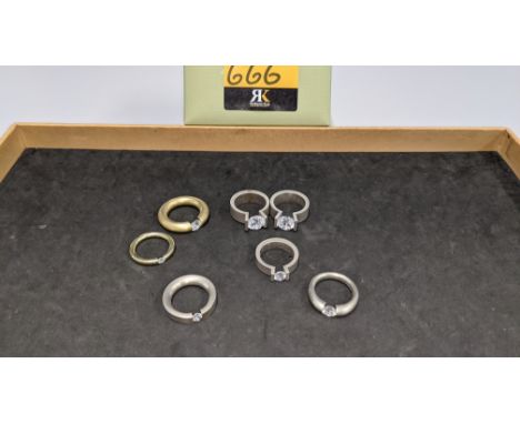 7 off modern rings, each with a single tension set gemstone - it is understood that these rings were used for display/sample 