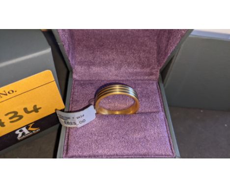 Titanium &amp; 18ct yellow gold ring RRP £623We have used a ring sizer mandrel to determine the inside diameter in mm of this