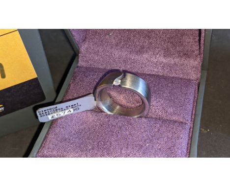 Diamond &amp; stainless steel tension ring RRP £574We have used a ring sizer mandrel to determine the inside diameter in mm o