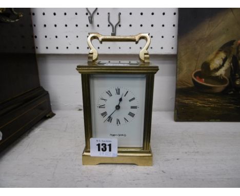 A MAPPIN AND WEBB BRASS CASED CARRIAGE CLOCK