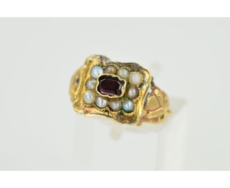 A LATE GEORGIAN GOLD, GARNET AND SPLIT PEARL MEMORIAL RING, the central garnet within a split pearl surround (one an imitatio