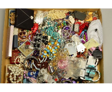 A BOX OF COSTUME JEWELLERY, to include a colourless paste and rolled gold ring, an enamel bangle, a pair of enamel and marcas