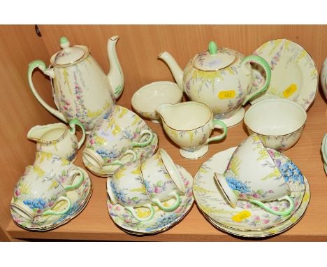 FOLEY CHINA 'HOLLYHOCKS' TEA/COFFEE WARES, to include coffee pot, cream jug, sugar bowl, six coffee cups and six coffee sauce
