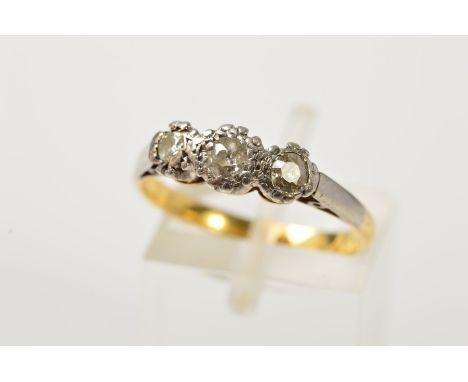 AN EARLY 20TH CENTURY 18CT GOLD THREE STONE DIAMOND RING, designed as three graduated diamonds, two old cut and one replaceme