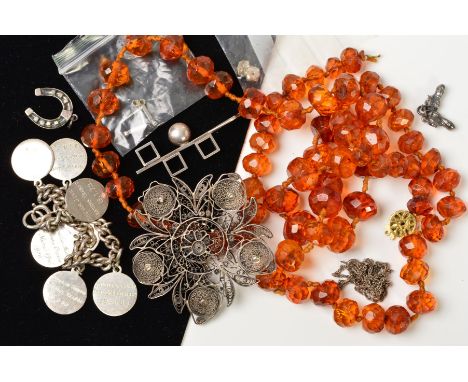 A SMALL SELECTION OF JEWELLERY, to include a Scandinavian abstract pendant set with a circular amethyst cabochon, by N.E. Fro
