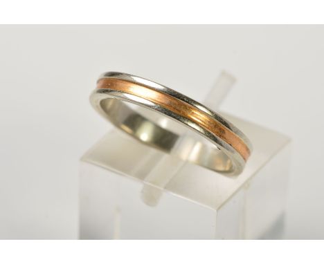 A BI-COLOUR BAND RING, with a central yellow gold band and slightly raised white gold edges, stamped 750, ring size L 1/2, ap