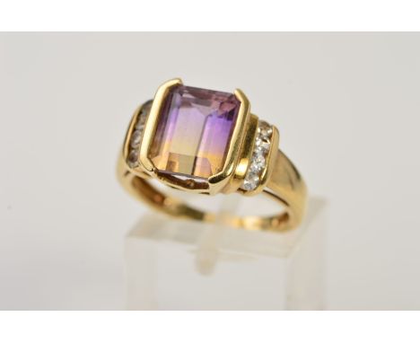 A 9CT GOLD AMETRINE AND ROCK CRYSTAL RING, designed as a central rectangular ametrine flanked by a row of four circular colou