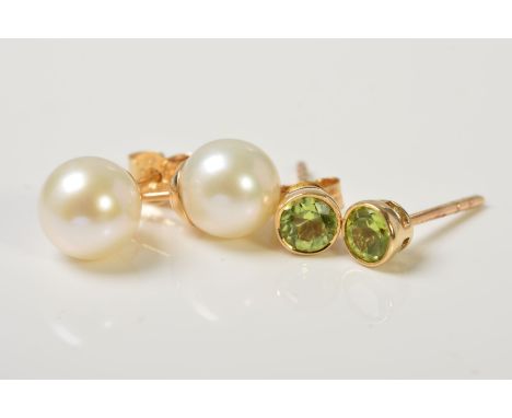 TWO PAIRS OF GEM EARRINGS, the first a pair of cultured pearl ear studs, stamped 375, the second a pair of circular peridot s