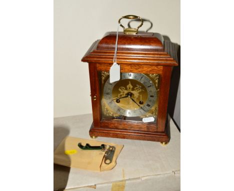 A CONTEMPORARY BRACKET CLOCK, with dial marked 'Cope, Jewellers', Roman numerals, height approximately 26cm, (with key and bo