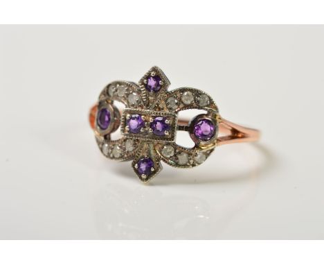 AN AMETHYST AND DIAMOND DRESS RING, of openwork fleur-de-lis style design, set with amethysts and diamonds, stamped 15ct, rin