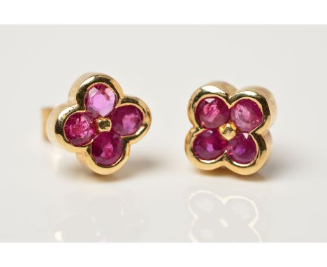 A PAIR OF 9CT GOLD RUBY STUD EARRINGS, each designed as four circular rubies in a quatrefoil shape to the plain collet settin