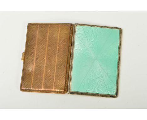 AN EARLY 20TH CENTURY ENAMEL FRONTED CIGARETTE CASE, of rectangular outline, with engine turned decoration and pastel green e